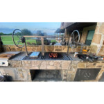 Stainless Argentine grill dropped into an island