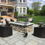 Fully assembled wood and charcoal grill frame insert for outdoor firepit