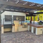 Wood burning grill insert for brick outdoor kitchen