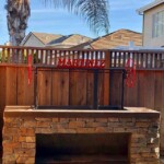 Dual rack charcoal grill in black iron