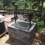 A grill for cooking outdoors with wood or charcoal.