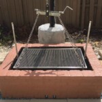 Hoist system for cooking over a wood fire.